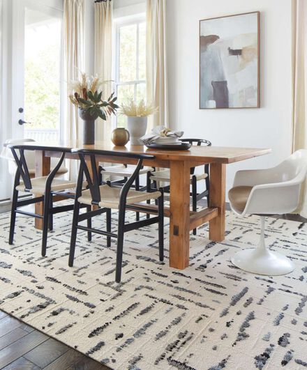 FLOR Lilting dining room rug shown in Grey